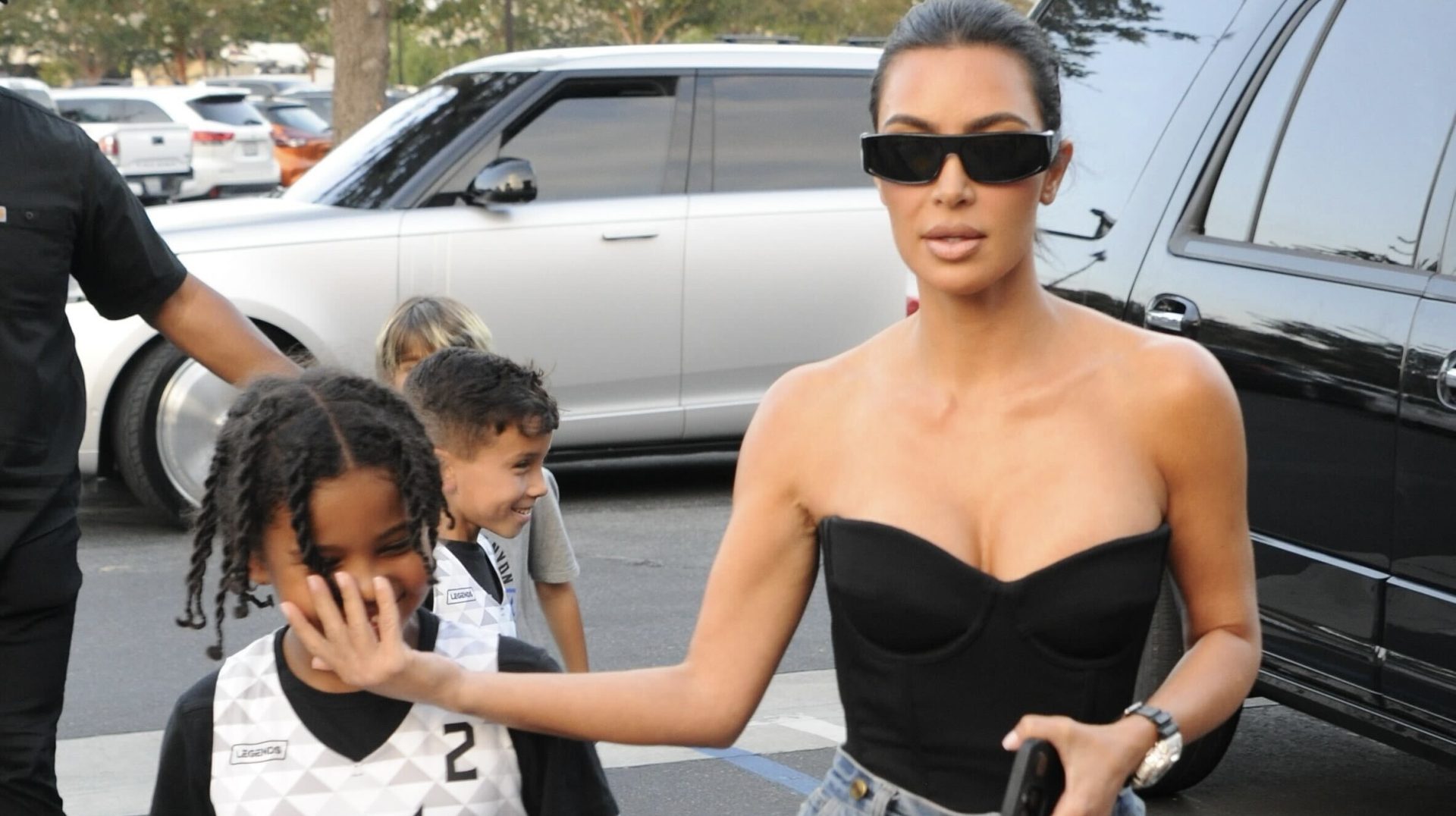 Not Havin' It! Saint West Flips Off Paparazzi While Out & About With Kim Kardashian